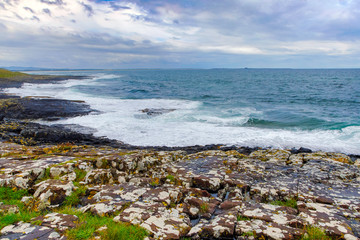 Views of  bamburgh beach castle and lighthouse