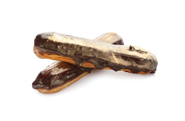 Delicious eclairs on white background