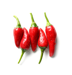 Red hot chili peppers on white background