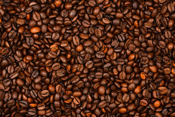 Coffee beans background. Top view. Coffee beans texture.