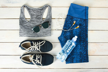 Sportswear, water and headphones