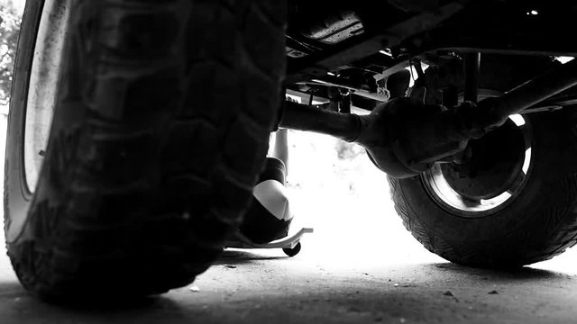 Technicians are working by doing a preliminary inspection of wheel system footage slow motion