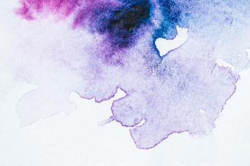 abstract background with bright purple watercolor blots