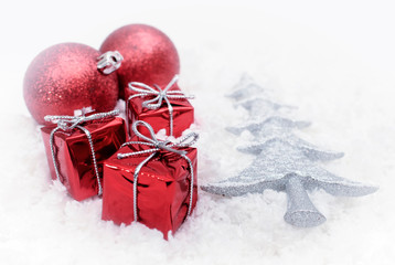 Christmas decoration balls and gifts on white background 
