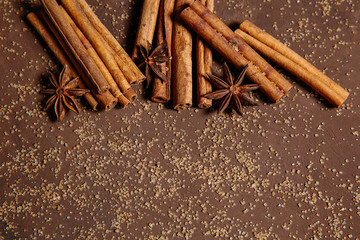 spices and brown sugar for a Christmas baking in a wooden bowl, selective focus