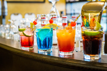 A Set of the Different Kind of Alcoholic Cocktails in the Bar at the Evening Party