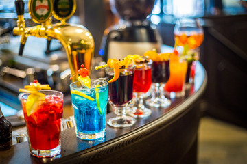 A Set of the Different Kind of Alcoholic Cocktails in the Bar at the Evening Party