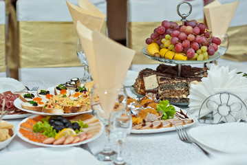 delicious dishes on the table in the restaurant. serving table.