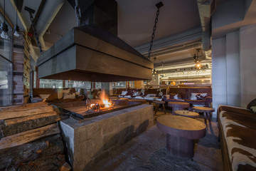 Big retro fireplace in interior