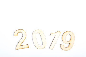 2019 year celebrate with wooden numbers on white background