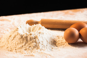 Hands of a chef baker woman kneading dough