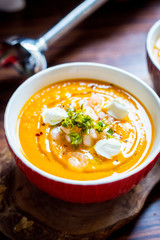 Sweet Potato Soup with Carrot, Pumpkin, Shrimps, Feta Cheese, Parsley and Red Pepper