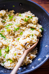 Mushroom Risotto in Iron Pan with Herbs and Parmesan Cheese, Top View