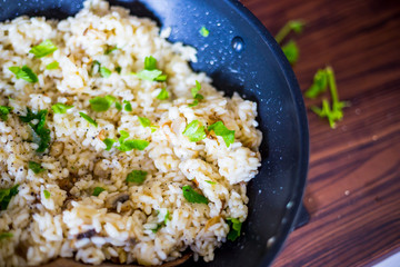 Mushroom Risotto in Iron Pan with Herbs and Parmesan Cheese, Top View
