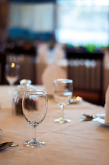 Selective focus of empty wine glass on the banquet table