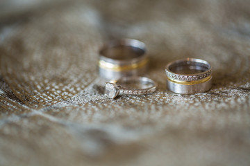 Obraz na płótnie Canvas wedding rings on a white background