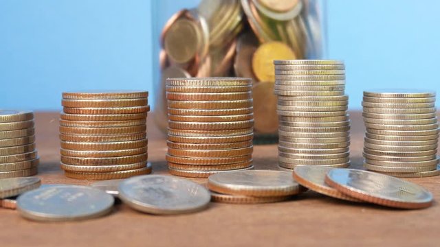 stack of coins,concept save money blue background