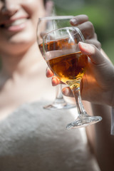 glass of wine in hand