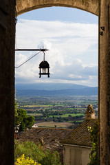 Countryside views from an ancient arc in Assisi, Umbria, Italy