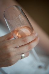 woman holding a glass of champagne