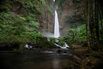 Beautiful foliage and landscape at the Kapas Biru waterfall in East Java, Indonesia