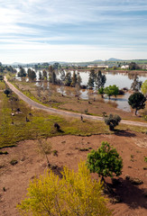 Fototapeta na wymiar Guadiana river next to the fields of Extremadura on a sunny day