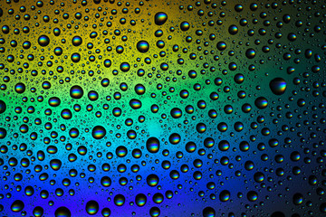 variegated water droplets on glass