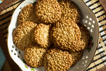 cookies with sesame seeds on a plate