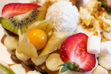 cake with strawberries and marshmallow close-up