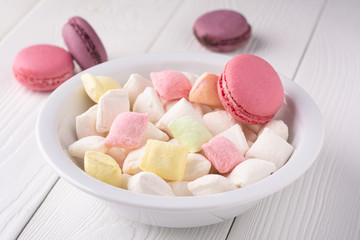 colorful candy and macaroni on a white table