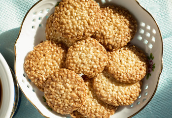 cookies with sesame seeds on a plate
