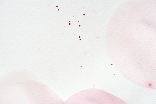 abstract background with light pink watercolor painting on white paper