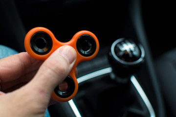 spinner in the car