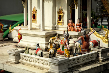 Fototapeta premium Close up shot of small temple model of buddhist spirit house in Bangkok, Thailand