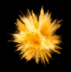 Colored powder explosion on black background