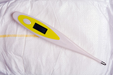 electronic thermometer on a diaper