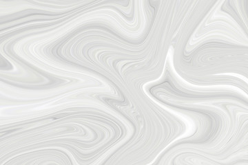 The marble is white. Background with a blurry pattern of light color.