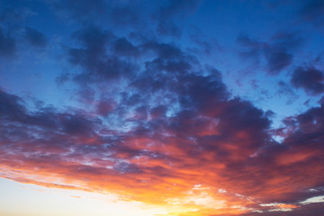 Naklejka na ściany i meble dramatic sunset in the sky. combination of cold and warm shades