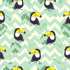 Tropical seamless pattern with toucans, exotic leaves and pineapples. Vector illustration