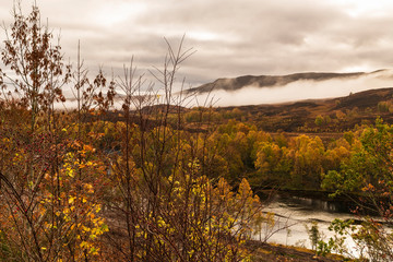 Fototapeta premium An autumnal image of Shiehallion and the river Tummel in Perth and Kinross, Scotland