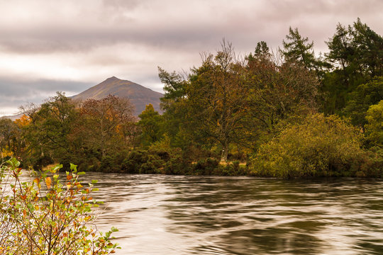 An autumnal image of Shiehallion and the river Tummel in Perth and Kinross, Scotland.