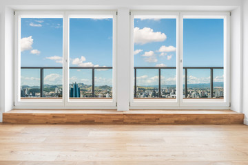 inside penthouse apartment  room with window view over skyline through  