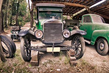 An antique, vintage car and truck