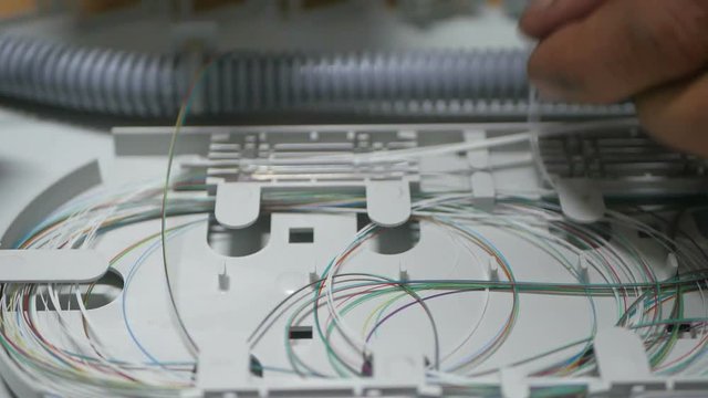 Engineer repairs equipment in server room