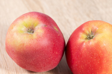 red apples on a wooden background