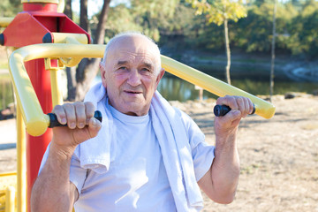 elderly people doing sport outdoors