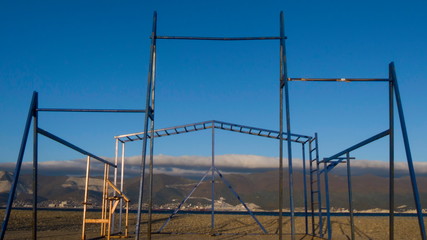 Horizontal bar, sea and mountains background