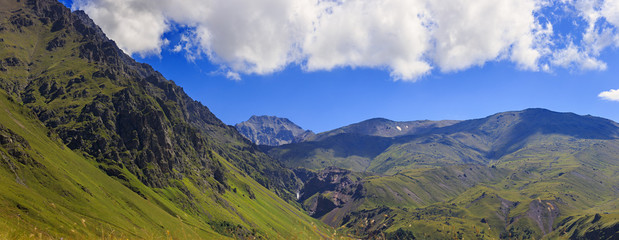 Fototapeta na wymiar Panoramic view of the mountain valley near Elbrus in the North Caucasus.