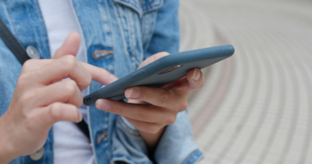 Woman use of smart phone at outdoor