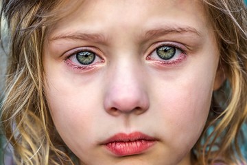 Portrait of sad little girl